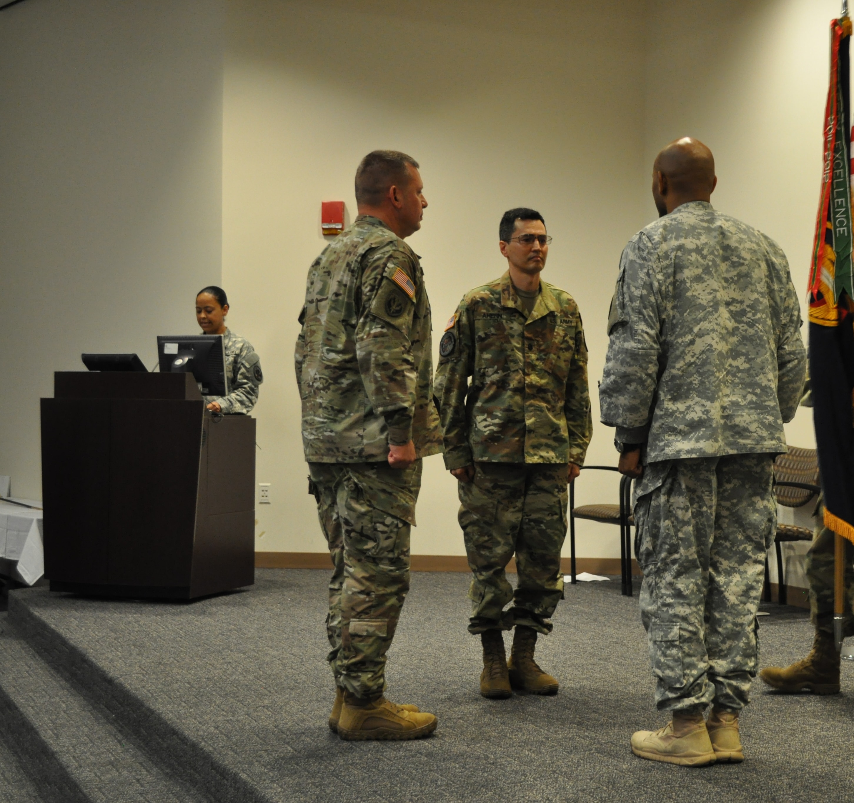 6th Battalion ARCD ceremony, soldiers at attention with guidon