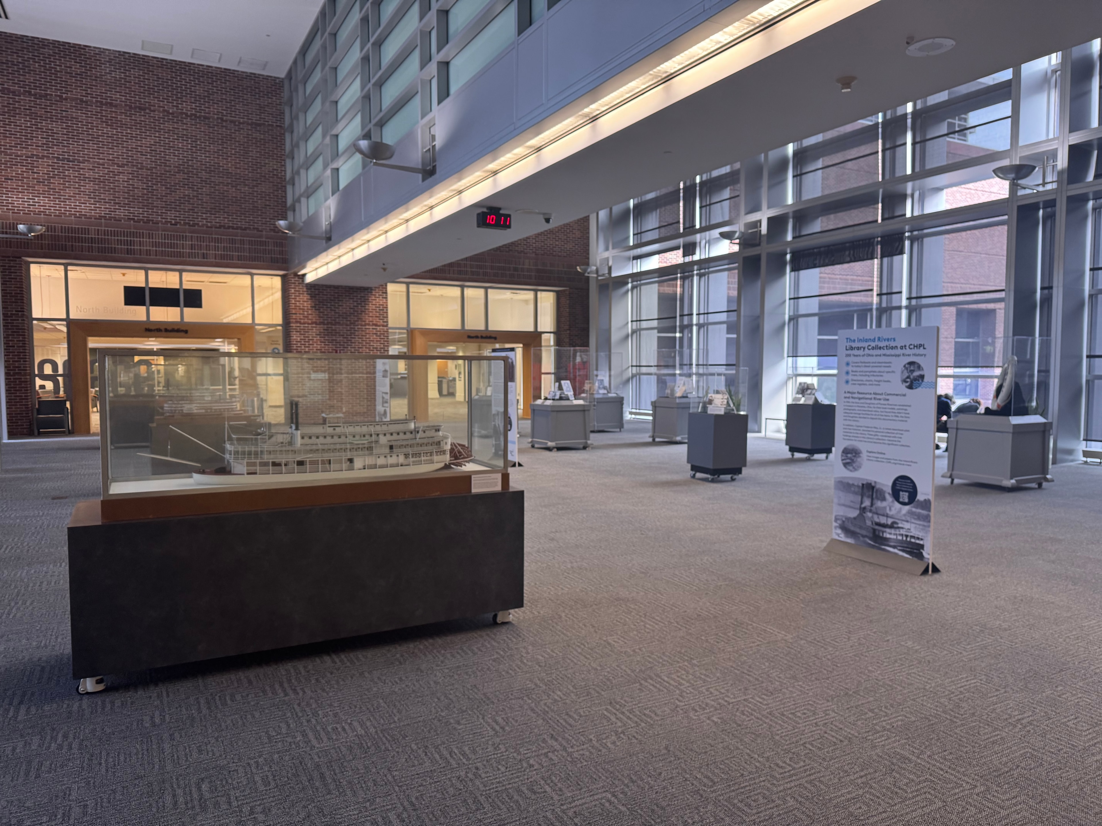 Cincinnati Public Library exhibition atrium with ship-model display and Inland Rivers collection exhibit