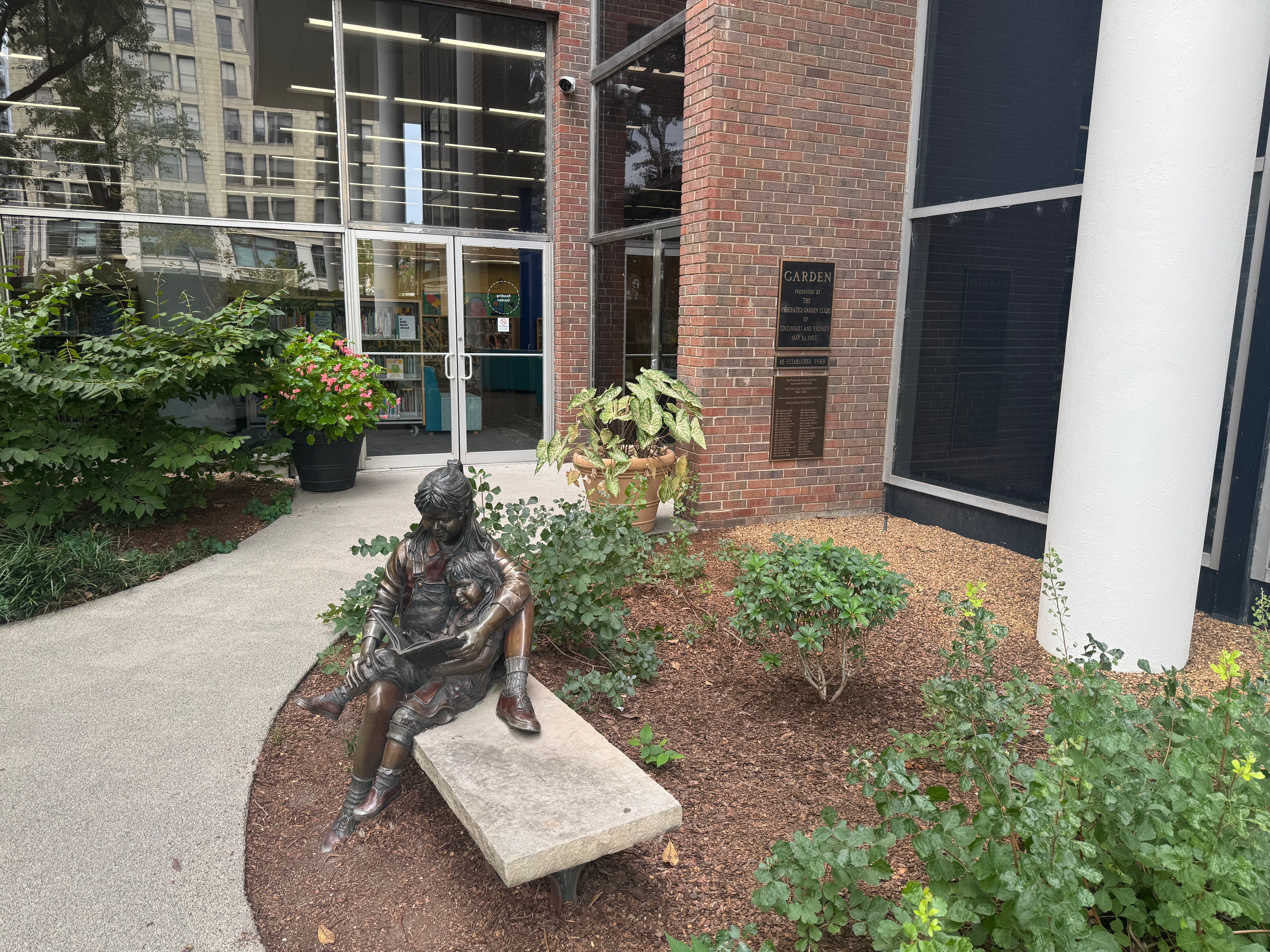 Cincinnati Public Library garden courtyard with bronze reading sculpture